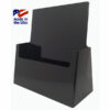 An elegant black lettersize brochure holder placed on a countertop, creating a striking visual contrast.