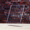 A clear acrylic sign holder perfect for displaying information.