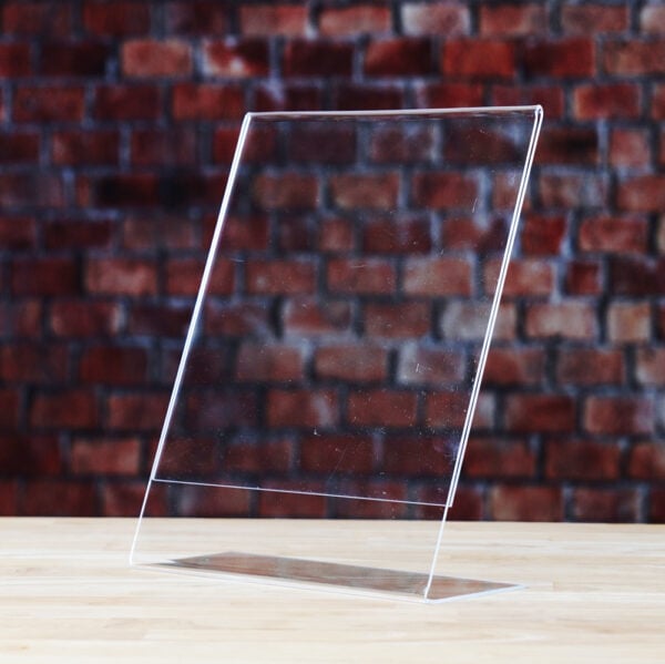 A clear acrylic sign holder perfect for displaying information.