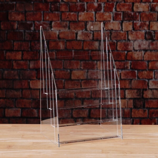 A transparent plastic rack with Fout shelves for displaying items.